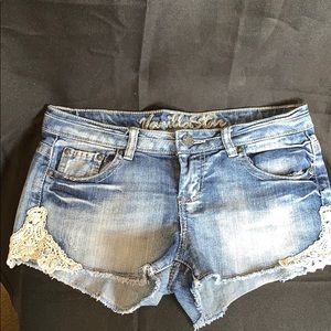 Denim shorts with side lace accent